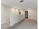 Upstairs hallway leading to bedrooms at 1739 Broad Winged Hawk Dr, Ruskin, FL 33570