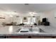 Well-equipped kitchen overlooking the living and dining areas, perfect for entertaining and gatherings at 1739 Broad Winged Hawk Dr, Ruskin, FL 33570