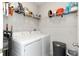 Laundry room with washer, dryer, and shelving at 1739 Broad Winged Hawk Dr, Ruskin, FL 33570
