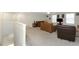 A cozy living room with a ceiling fan and plenty of seating at 1739 Broad Winged Hawk Dr, Ruskin, FL 33570