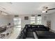 Open floor plan showcasing living and dining areas with seamless access to the outdoor patio at 1739 Broad Winged Hawk Dr, Ruskin, FL 33570