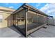 A screened-in lanai with dark screens lets light in while providing shade and privacy at 1739 Broad Winged Hawk Dr, Ruskin, FL 33570