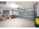 Two car garage offers lots of storage and overhead lighting at 3389 Pennyroyal Rd, Port Charlotte, FL 33953