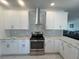 Well-equipped kitchen featuring stainless steel appliances and ample counter space at 8343 Fantasia Park Way, Riverview, FL 33578