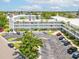 Exterior shows manicured landscaping and dedicated parking for residents within the community at 2401 Ecuadorian Way # 45, Clearwater, FL 33763
