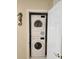 Efficiently stacked white washer and dryer inside of laundry closet at 2401 Ecuadorian Way # 45, Clearwater, FL 33763