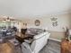 Inviting living room featuring hardwood floors, neutral colors, and a comfortable seating arrangement at 2401 Ecuadorian Way # 45, Clearwater, FL 33763