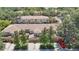 Townhomes feature a mix of architectural details nestled among lush greenery in a vibrant community at 4510 Limerick Dr, Tampa, FL 33610