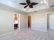 Bedroom with ensuite bathroom and walk-in closet at 4510 Limerick Dr, Tampa, FL 33610