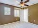 Bedroom with carpet, ceiling fan, and natural light from a window at 4510 Limerick Dr, Tampa, FL 33610