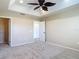 Bedroom with view of closet, ensuite bathroom, and trey ceiling at 4510 Limerick Dr, Tampa, FL 33610