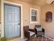 Cozy front porch with seating area, perfect for relaxing and enjoying the outdoors at 4510 Limerick Dr, Tampa, FL 33610