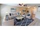 Cozy living room featuring hardwood floors, comfortable seating, and stylish decor at 4510 Limerick Dr, Tampa, FL 33610