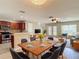 Open-concept living and dining area featuring modern decor and a seamless flow into the kitchen at 4510 Limerick Dr, Tampa, FL 33610