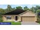 Charming single-story home featuring a two-car garage, well-manicured lawn, and stylish architectural details at 4858 Sutherland St # Lot 61, Spring Hill, FL 34609