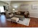 Comfortable living room features hardwood floors, stylish seating, and elegant decor at 9685 Southern Belle Dr, Weeki Wachee, FL 34613