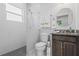 Modern bathroom with glass shower, granite vanity, and contemporary fixtures at 10391 Coquina Ct, Placida, FL 33946