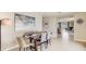 Inviting dining area with table, chairs, and stylish decor, ideal for Gathering meals and gatherings at 30852 Wild Juniper Ct, Brooksville, FL 34602