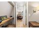 Hallway with wood floors that leads into a sitting room at 8309 Oakgren Rd, Brooksville, FL 34601