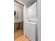 Convenient laundry room with stacked washer and dryer units at 8309 Oakgren Rd, Brooksville, FL 34601