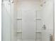 Clean and modern shower with a glass door and tiled walls at 8309 Oakgren Rd, Brooksville, FL 34601