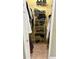 Walk-in closet with metal shelving for shoes and clothes organization at 1138 Lumsden Trace Cir, Valrico, FL 33594