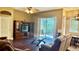 Spacious living room with patio doors that let in natural light at 1138 Lumsden Trace Cir, Valrico, FL 33594