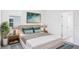 Stylish bedroom featuring soft hues, comfortable decor, and plenty of natural light at 11296 Curio Dr, Brooksville, FL 34613