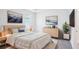 Comfortable main bedroom with soft lighting, contemporary decor, and ample space at 11296 Curio Dr, Brooksville, FL 34613