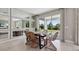 Dining room features a large sliding glass door and unique mirror wall at 11352 Curio Dr, Brooksville, FL 34613