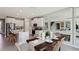 Open concept kitchen and dining room with modern decor and fixtures at 11352 Curio Dr, Brooksville, FL 34613