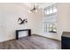 Dining Room featuring wood floors, tall ceilings and large window at 305 Lake Tahoe Ct, Englewood, FL 34223