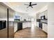 Spacious kitchen features stainless steel fridge, and stainless steel oven at 305 Lake Tahoe Ct, Englewood, FL 34223