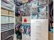 Organized closet with shelving, drawers, hanging racks and storage containers for storing personal items and clothing at 6812 Gideon Cir, Zephyrhills, FL 33541