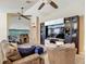 Comfortable living room area with vaulted ceilings and open floor plan at 6812 Gideon Cir, Zephyrhills, FL 33541