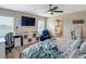 Serene main bedroom with ample natural light, modern furnishings, and a view of the en-suite bathroom at 6812 Gideon Cir, Zephyrhills, FL 33541