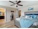 Inviting main bedroom with modern décor, an en-suite bathroom, and soothing color tones at 6812 Gideon Cir, Zephyrhills, FL 33541