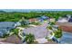 Aerial view of a home in a cul-de-sac with mature trees and well-kept lawns in a Gathering-friendly community at 205 Bengal Cir, Oldsmar, FL 34677