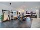 Open-concept dining room with modern lighting, stylish decor, and easy access to the kitchen, great for gatherings at 205 Bengal Cir, Oldsmar, FL 34677