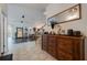 Inviting entryway featuring a wood dresser, decorative mirror, and stylish decor at 205 Bengal Cir, Oldsmar, FL 34677