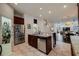 Spacious kitchen connects to the living spaces and features stainless steel appliances at 205 Bengal Cir, Oldsmar, FL 34677