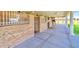 Spacious barn interior featuring stone pillars and stalls for horses at 15200 Rawls Rd, Sarasota, FL 34240
