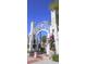 Image of Sarasota Bayfront welcome sign, a beautiful entrance with palm trees and blue skies in the background at 15200 Rawls Rd, Sarasota, FL 34240