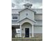 An elegant exterior view showcasing the home's architectural details and welcoming entrance at 15200 Rawls Rd, Sarasota, FL 34240