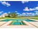 Inviting pool and spa area surrounded by lush greenery, perfect for relaxation and entertainment at 15200 Rawls Rd, Sarasota, FL 34240