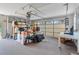 Spacious garage with ample storage space, shelving, and room for vehicles or projects at 10230 289Th E St, Myakka City, FL 34251