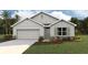 Charming single-Gathering home with a two-car garage and well-manicured lawn at 10401 Tucker Rd, Weeki Wachee, FL 34613