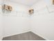 Spacious walk-in closet with ample shelving and organization options at 10434 Tucker Rd, Weeki Wachee, FL 34613