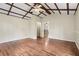 This bonus room offers hardwood floors and unique architecture at 304 Highland St, Brooksville, FL 34601