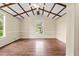 This is a bonus room with an exposed wood ceiling at 304 Highland St, Brooksville, FL 34601
